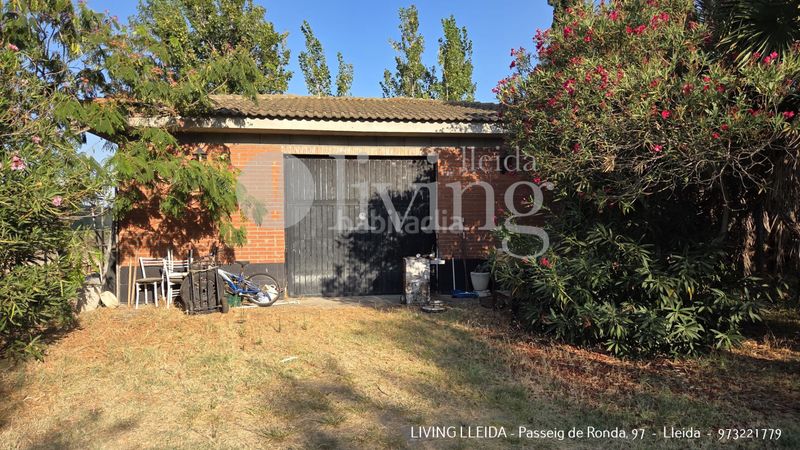 Foto ad4fd3e6-7414-4b4d-9dc8-d6cb957f1707. Casa amb xemeneia calefacció aparcament piscina a Lleida
