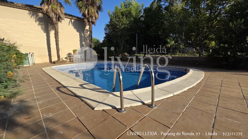 Foto b60de7ff-482b-440f-a45e-92bfd0e1c210. Casa amb xemeneia calefacció aparcament piscina a Lleida