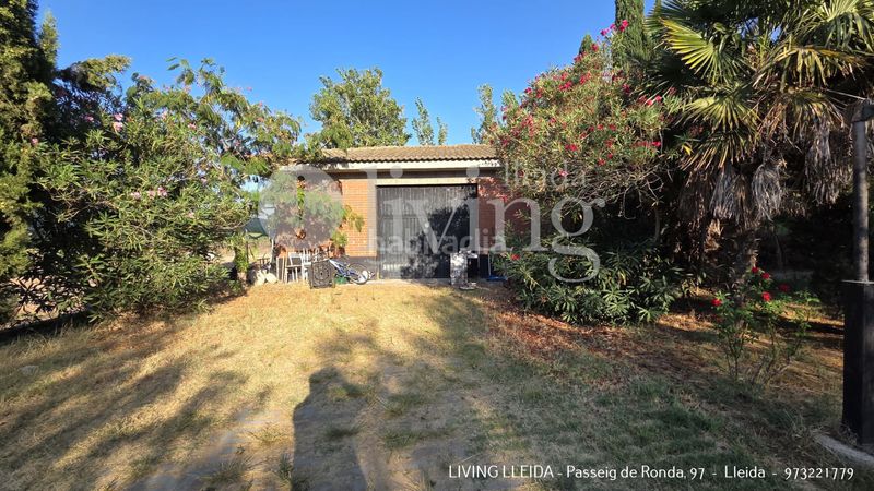 Foto bbf76a69-baf9-426f-9d02-fbb325c577e0. Casa amb xemeneia calefacció aparcament piscina a Lleida