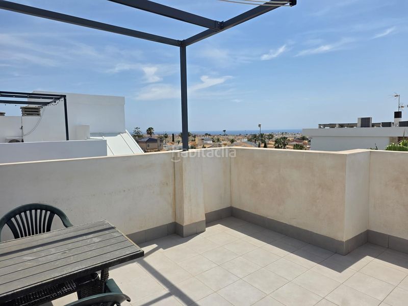 Foto 1e4f8f64-7a47-4a76-8391-add11a9a9e1d. Casa adossada amb aparcament a Lomas de Cabo Roig - Los Dolses Orihuela