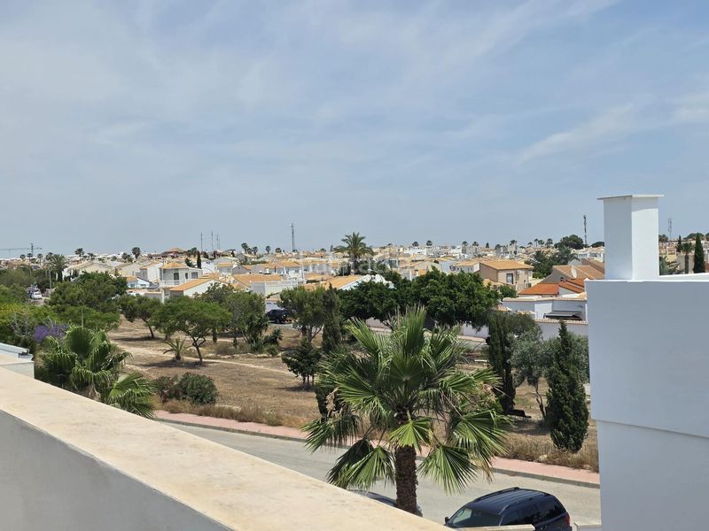 Foto 5c74a1eb-0ce6-4ddc-8680-65e4f4e2067d. Casa adossada amb aparcament a Lomas de Cabo Roig - Los Dolses Orihuela