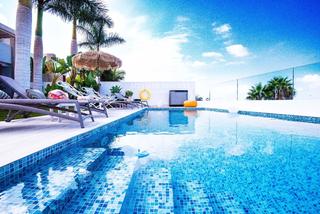 Casa a La Caleta. Exclusiva villa pareada frente al golf de costa adeje