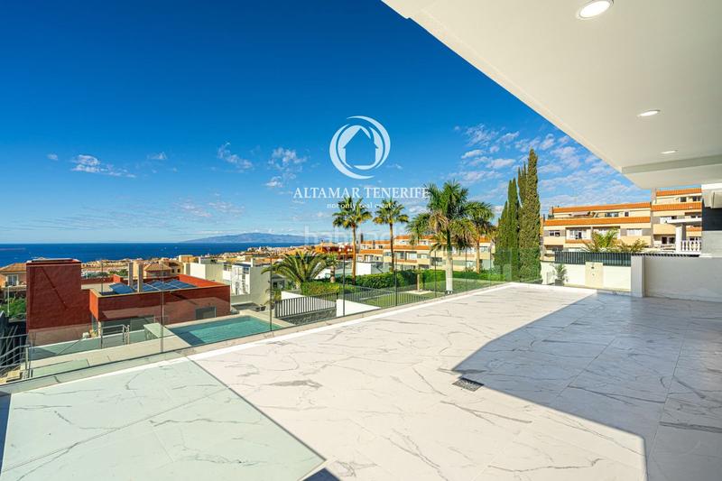 Foto cb5d015f-65fb-48c8-8b66-4acf7285adee. House with parking pool in Playa Fañabé Alto Adeje