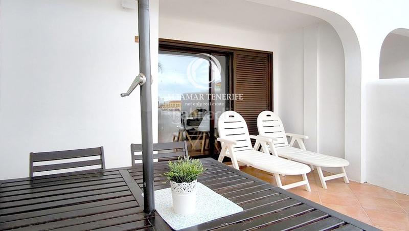 Foto fcaad5c5-ff1e-43e0-928a-57b51cdb759f. Apartamento  en playa paraíso con terraza, garaje y piscina comunitaria en Adeje