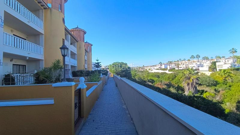 Foto 29d2a7ef-66c9-454c-b669-75f28b2bee2d. Appartement avec parking piscine dans Cabo Roig Orihuela