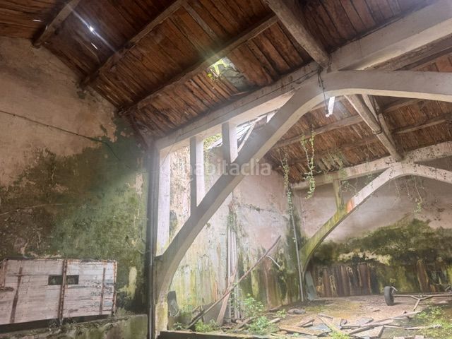 Foto d6f9fbb2-d9c0-4855-94be-78da7bc1b59e. Nau industrial a Ribadeo