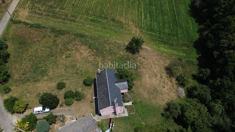Foto e6c479fe-7408-44f7-aefa-ed3b1c952736. Masia amb xemeneia calefacció a Trabada