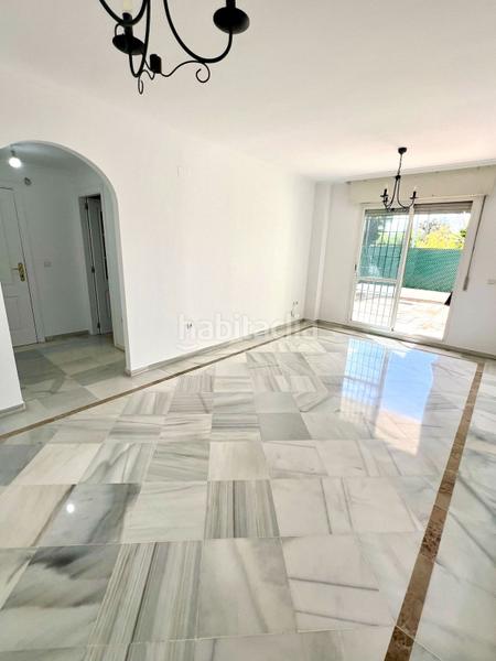 Foto 2beb2228-3842-4e82-bacc-04d5b718f632. Planta baixa amb aparcament piscina a Nueva Andalucía centro Marbella