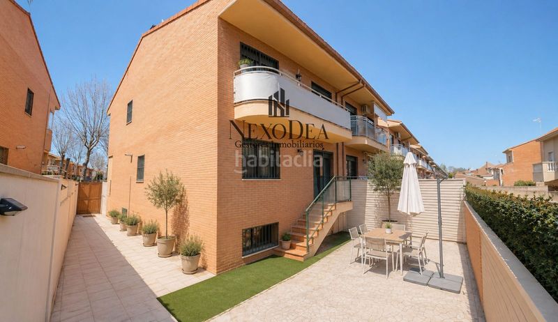 Foto b872a491-839a-44ba-af9b-108c4f7b5fb5. Casa aparellada amb aparcament a Los Robles Seseña