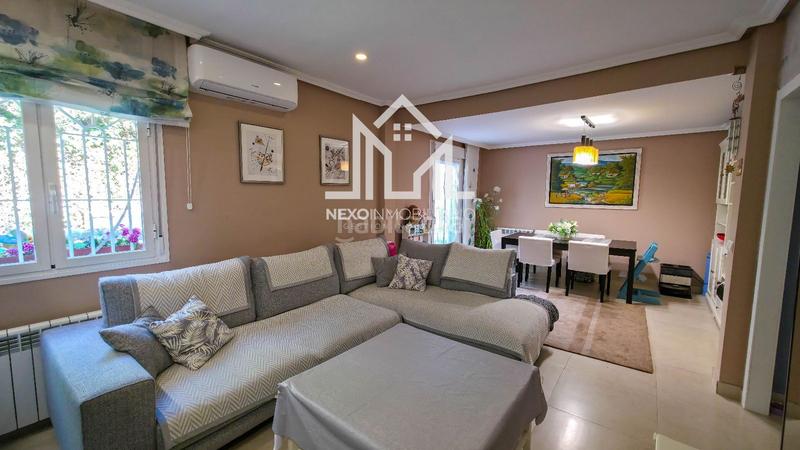 Foto 30a05433-f3d9-4664-9a6a-e5d4da5b68f0. Casa aparellada amb aparcament piscina a Seseña nuevo Seseña