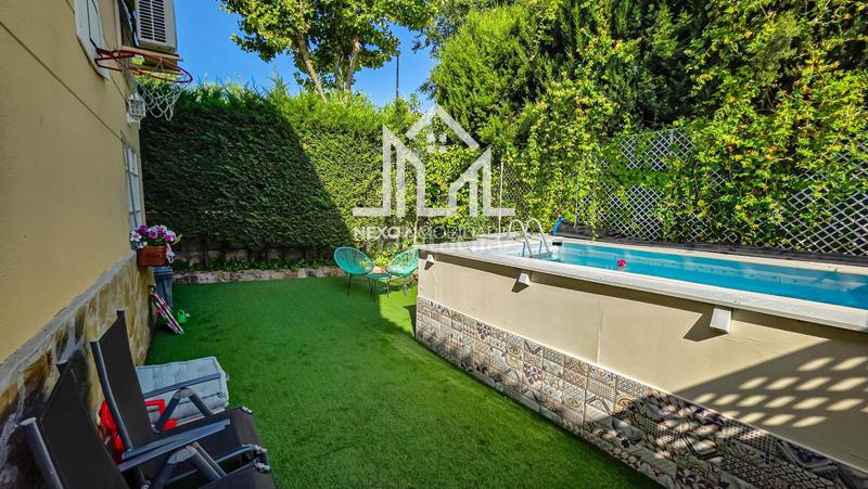 Foto 4b257cb7-8d7c-4d35-9d22-99534b96b305. Casa aparellada amb aparcament piscina a Seseña nuevo Seseña