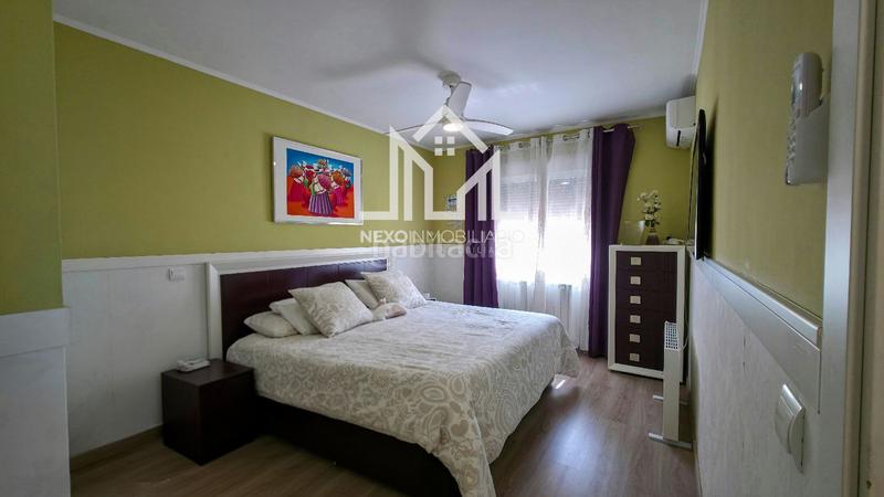 Foto 9ef20698-0793-4e1f-8ec3-4a4aef454e16. Casa aparellada amb aparcament piscina a Seseña nuevo Seseña