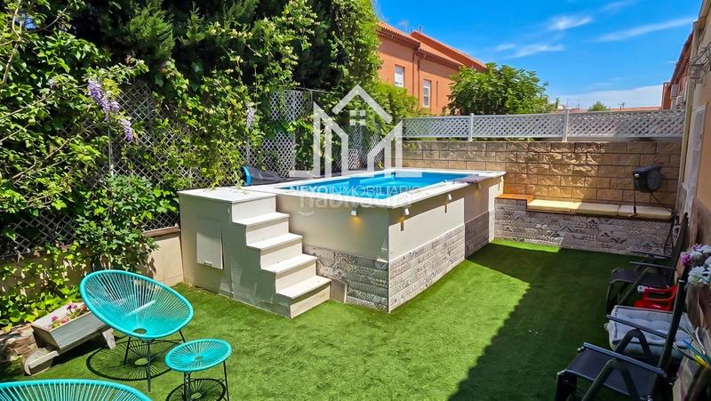 Foto a15d50fa-ec3a-47ea-9322-098400af966d. Casa aparellada amb aparcament piscina a Seseña nuevo Seseña