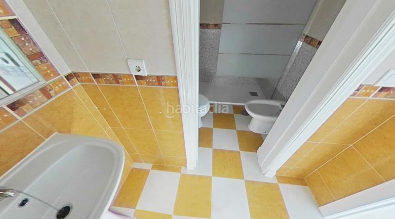 Foto f2b615cc-8068-42d0-9033-4b38bf3fe15f. Casa adosada en Alcorrín Manilva
