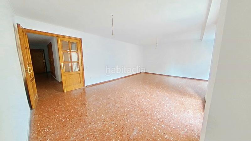 Foto f06fa686-302a-4159-b675-3ec482d39c61. Appartamento in Torrefiel Valencia