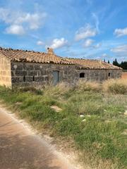 Proprit dans Muro. Dos terrenos rsticos en muro