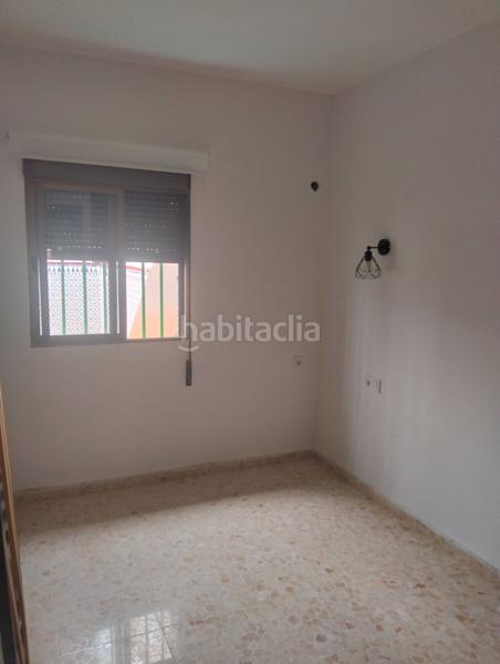 Foto 9afacf91-b0f1-4797-9400-425eb59e62fa. Casa adossada amb xemeneia a Punta Umbría