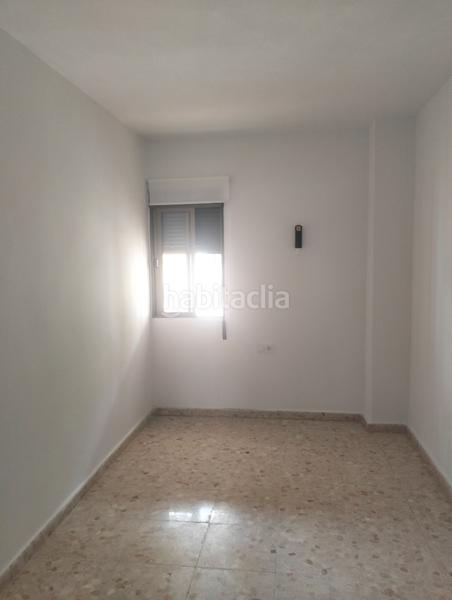 Foto ca56fe71-5660-4e8b-ab71-1f90ca4b7598. Casa adossada amb xemeneia a Punta Umbría