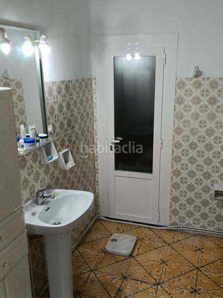 Foto 01839f90-fc8c-43e3-bc9f-cc3ad13fdeb3. Casa con camino riscaldamento parcheggio in Tomelloso