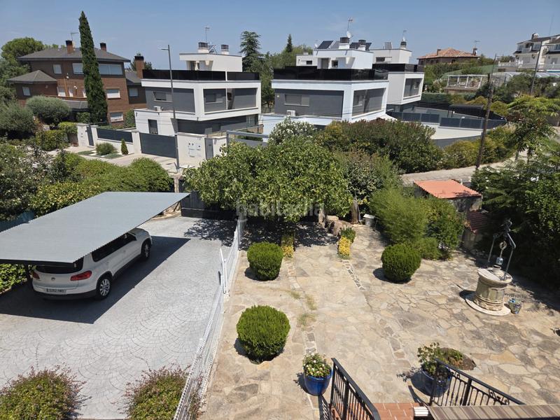 Foto 1174301f-9e00-4f2f-a176-bbd819c62b88. Chalet mit kamin heizung parking pool in Parque Coimbra Móstoles