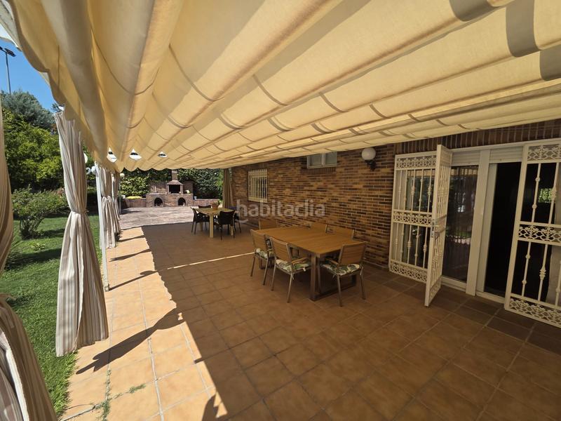 Foto 184e0a97-862c-4455-be2e-6344b0a1e674. Chalet mit kamin heizung parking pool in Parque Coimbra Móstoles