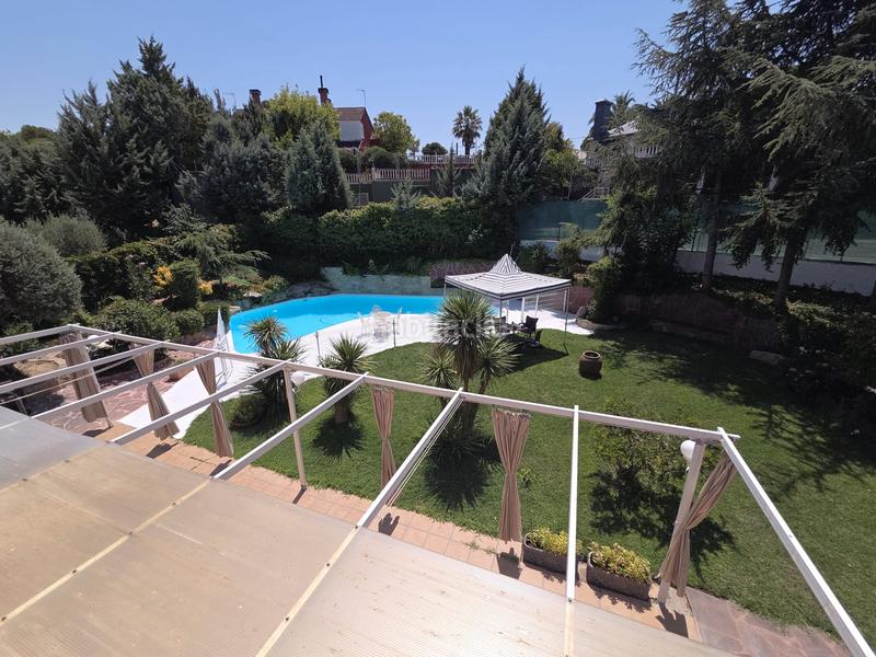 Foto 1c21149a-4f7b-4522-b523-90d960de655b. Chalet mit kamin heizung parking pool in Parque Coimbra Móstoles