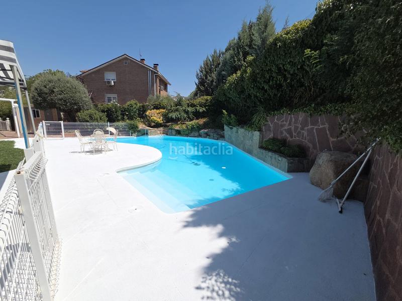 Foto 5175df82-b266-4446-a6fc-44c68a29a000. Chalet mit kamin heizung parking pool in Parque Coimbra Móstoles