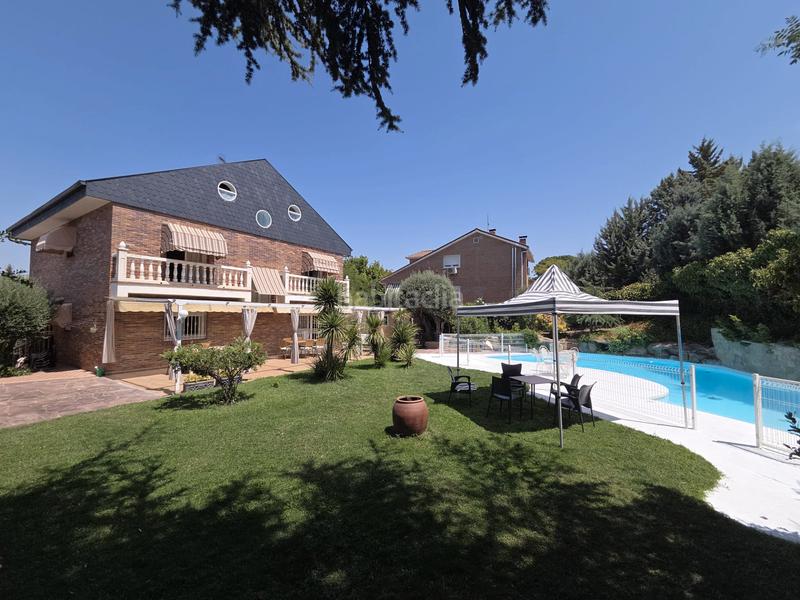 Foto 58d88386-070b-42d4-ab97-efda54c01bae. Chalet mit kamin heizung parking pool in Parque Coimbra Móstoles