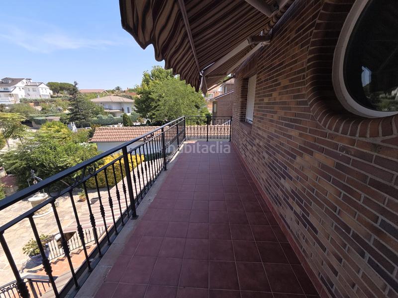 Foto 9a2ea19d-4cc6-4bbd-8eba-b1261bf2f68e. Chalet mit kamin heizung parking pool in Parque Coimbra Móstoles