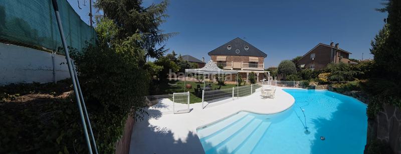 Foto ac3217f1-c4c8-490d-ae66-b93d412339c9. Chalet mit kamin heizung parking pool in Parque Coimbra Móstoles