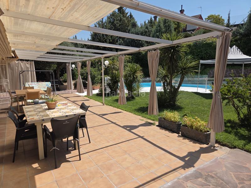 Foto dff69cc0-4593-43e1-9d85-f553b391f508. Chalet mit kamin heizung parking pool in Parque Coimbra Móstoles