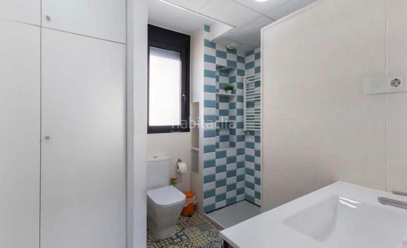 Foto cf483e99-352e-4722-b182-37c5acb1c985. Casa aparellada amb aparcament piscina a Barrio Benicalap Valencia