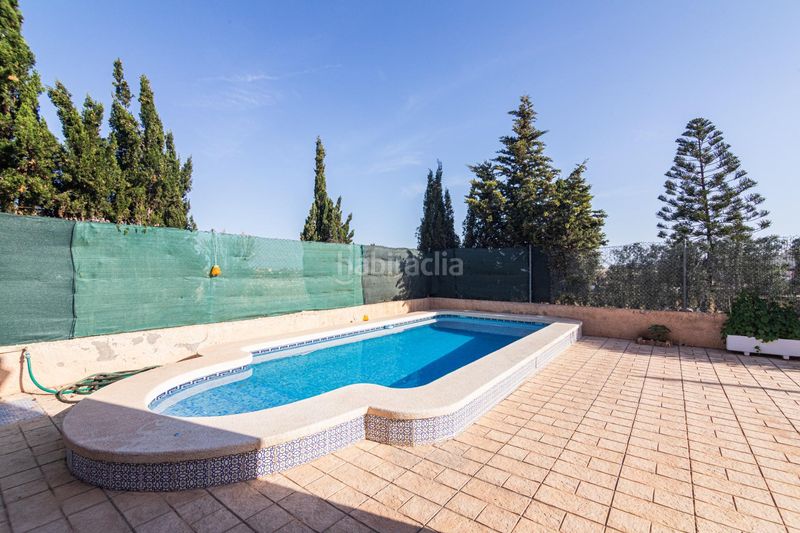 Foto 6c4c3022-16da-446e-ba02-ce54529b6dd3. Chalet con riscaldamento parcheggio piscina in Peña de las Águilas Elche / Elx