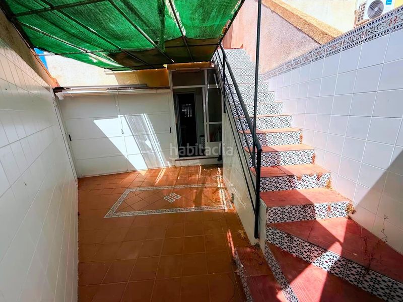Foto e37d165b-03cd-47fd-b06b-406c0fe2ae40. Casa adossada amb aparcament a Centro Alcázares (Los)