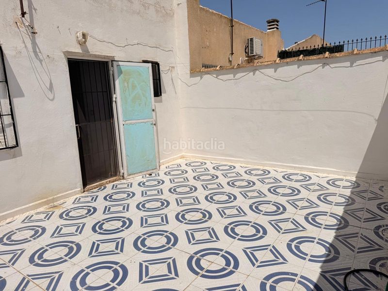 Foto 54c27403-563f-4fe6-9228-bebf97e289a4. Casa adossada amb aparcament a Centro Alcázares (Los)