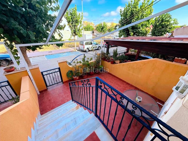 Foto ad6e9523-755e-4337-8cb6-84d78ce0dc22. Casa adossada amb aparcament a Centro Alcázares (Los)