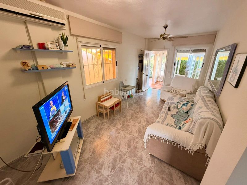 Foto d1d506ba-97f2-4ddc-9dcd-a48e9c34affd. Casa a schiera con parcheggio in Centro Alcázares (Los)