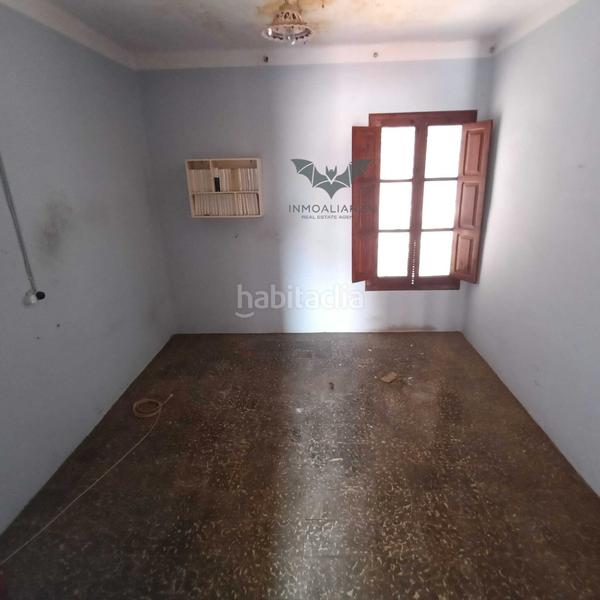 Foto b3091a37-841e-4dc8-9358-a9b011263104. Casa adossada amb aparcament a Polinyà de Xúquer