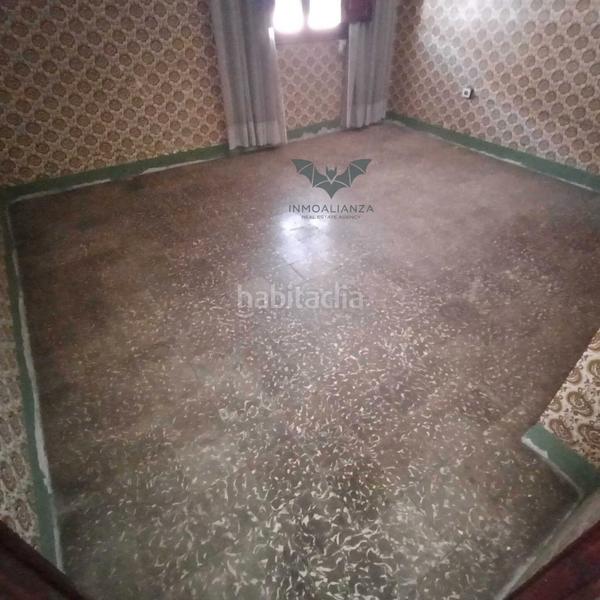 Foto f9be6e0b-7233-4053-8bc5-9de6a39611d6. Casa adossada amb aparcament a Polinyà de Xúquer