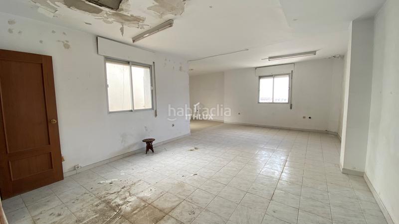 Foto bc66811b-3e48-4874-94ca-b20847353ae6. Casa adosada edificio en venta en el centro locales a pie de calle, vivienda alquilada y oficina convertible. precio en Villanueva de la Serena
