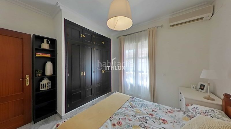Foto c69aec90-76e4-4c76-8a42-bd4861d0ee7f. Casa adossada a Umbrete
