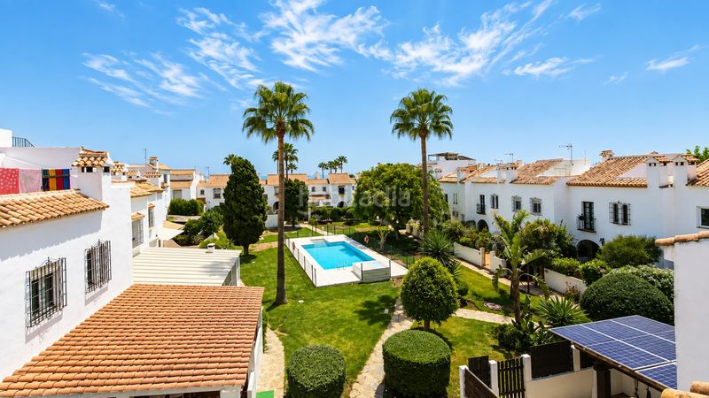 Foto ab32d84f-43d9-4ac9-9915-6fb051954082. Casa adossada amb piscina a marina de Casares Casares