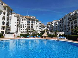 Planta baixa a Puerto de la Duquesa. Un encantador apartamento con jardín en una fantástica comunidad