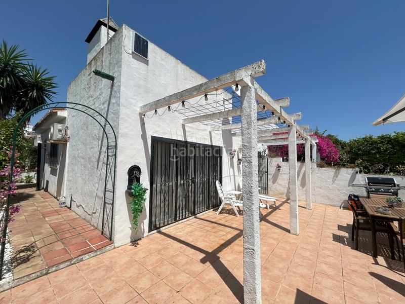 Foto 57a91cd7-de63-4c23-bc78-82444e04f803. Casa adossada amb piscina a Alcorrín Manilva