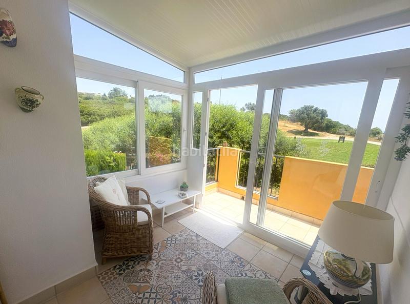 Foto 4a2f1f9f-55aa-41c8-9591-302c079d1f3d. Casa adosada preciosa casa adosada con un amplio jardín privado y una fantástica terraza, con vistas a las calles de duquesa golf. en Manilva