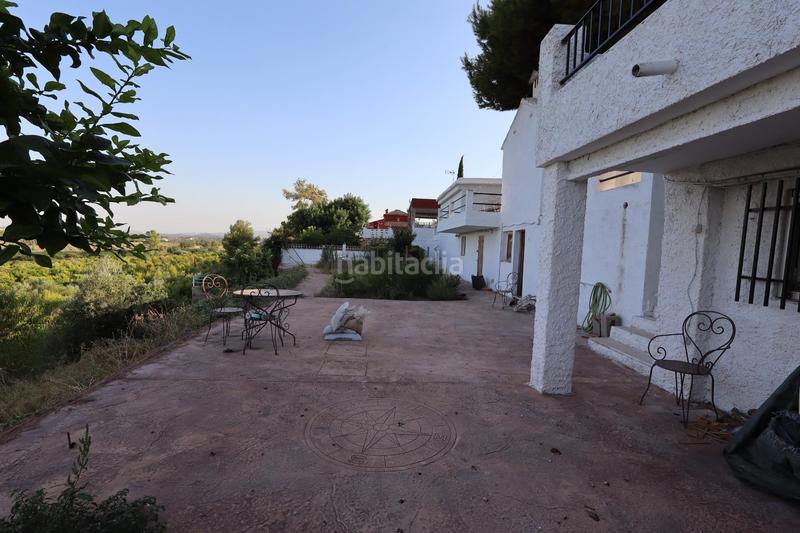 Foto d853e3f3-897a-4ea3-a54b-06021177914f. Chalet con riscaldamento parcheggio piscina in Godelleta