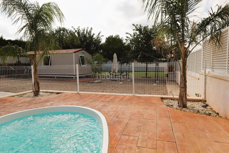 Foto a4a0c31c-c8cd-4cfc-b6f8-55af21254a02. Chalet con riscaldamento parcheggio piscina in Godelleta