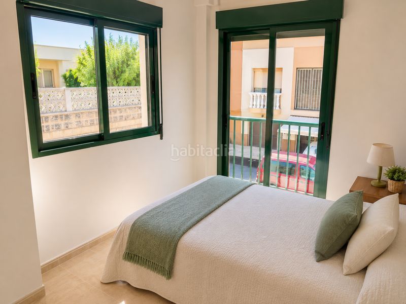 Foto 1c7b01ef-f9cc-4e3d-ba9f-b111befa82c5. Casa adossada a Les Palmeres Sueca