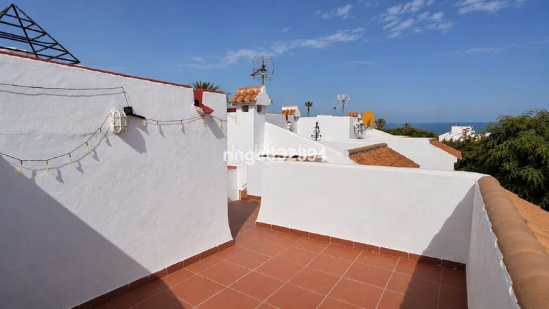 Foto ced05a45-b106-4b0f-b26a-03893e1fa646. Casa adossada amb aparcament piscina a marina de Casares Casares