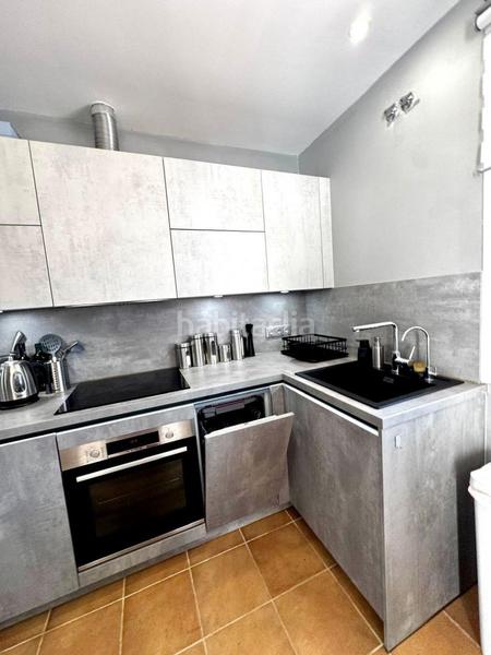 Foto 7a2bbbd2-bc10-41f5-a696-595fa09f20d6. Semi detached house with heating pool in Los Naranjos Marbella